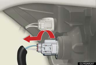 2. Turn the bulb base counterclockwise.