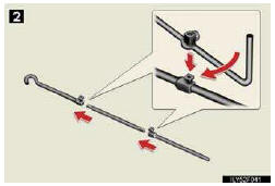 2. Assemble the jack handle extension bar and the jack han- dle bar and tighten