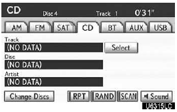 Touch “CD” tab, then touch “Change Discs”. Choose an audio disc number to