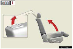 Place the child restraint system on the rear seat facing the rear of the vehicle.