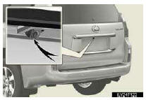 The rear view monitor camera is located on the back door as shown in the illustration.