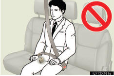 Do not use the third center seat belt with