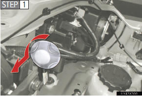 Turn the cover counterclock-